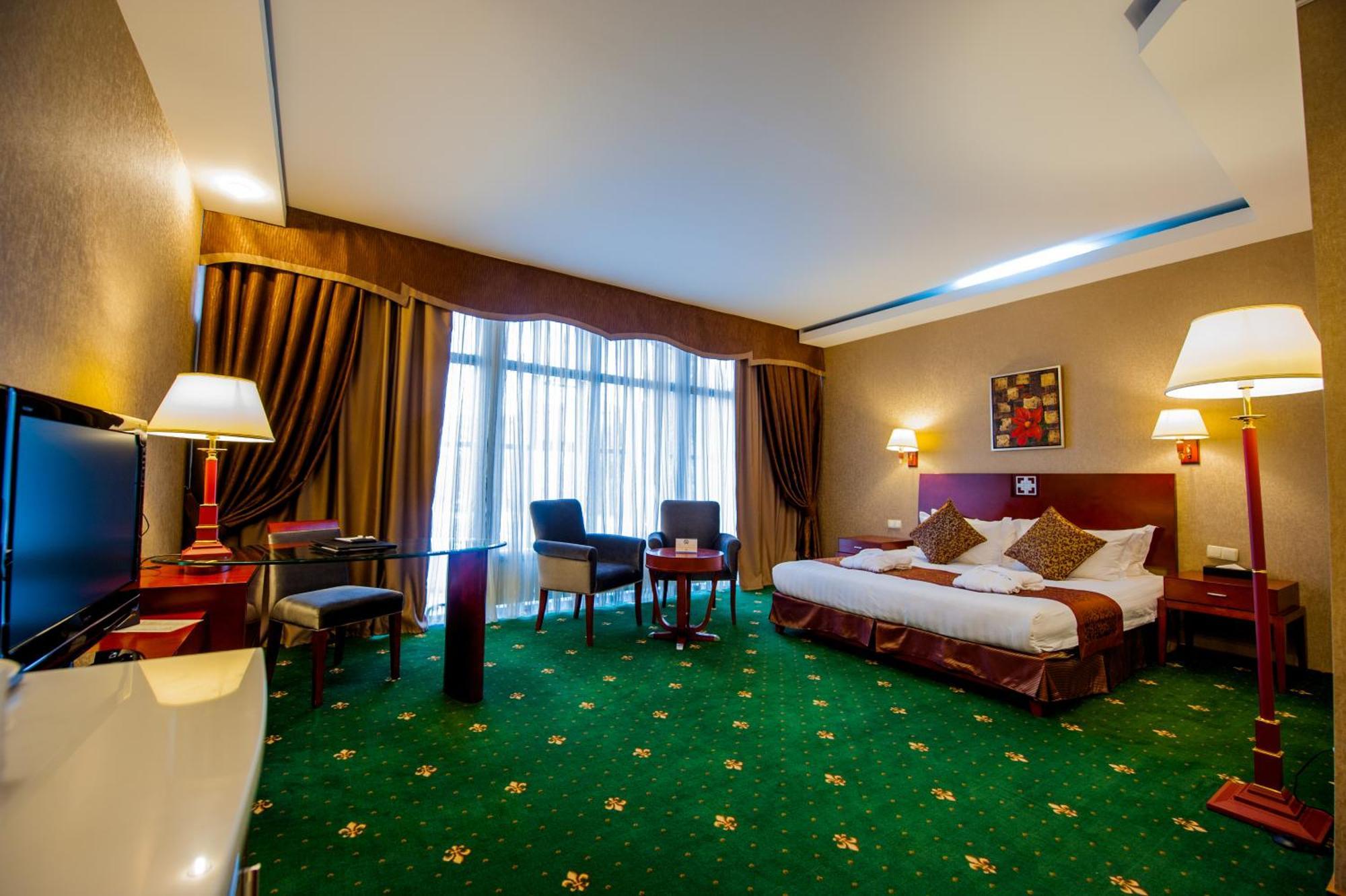 Hotel Goldman Empire Astana Pokoj fotografie